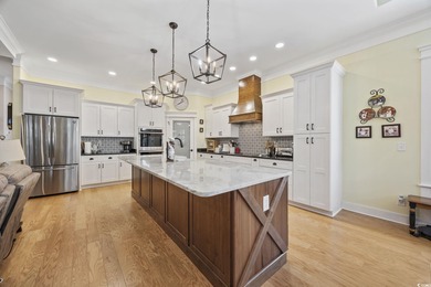 Experience the ease of single-level living in one of the rare