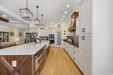 Experience the ease of single-level living in one of the rare