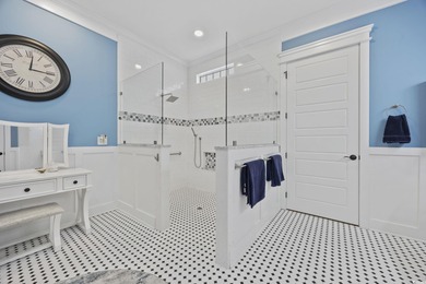 Experience the ease of single-level living in one of the rare