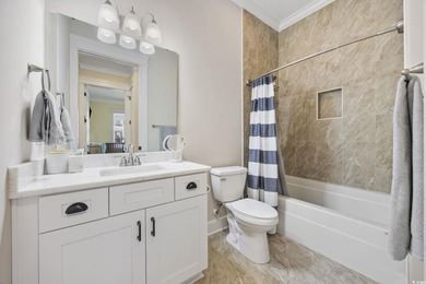 Experience the ease of single-level living in one of the rare