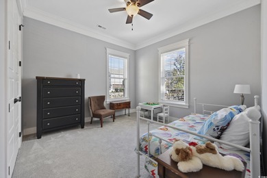 Experience the ease of single-level living in one of the rare