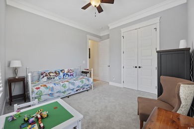 Experience the ease of single-level living in one of the rare