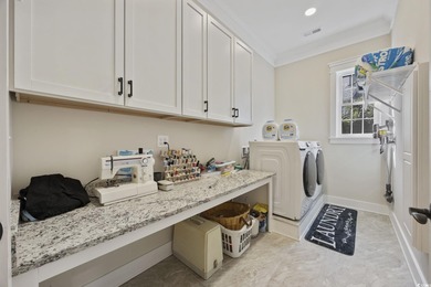 Experience the ease of single-level living in one of the rare