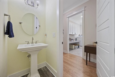 Experience the ease of single-level living in one of the rare