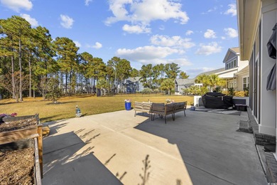 Experience the ease of single-level living in one of the rare