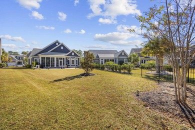 Experience the ease of single-level living in one of the rare