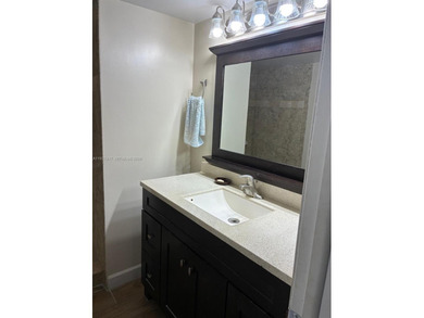 Elevated living meets total convenience in this charming