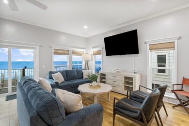 HIGHLIGHTS: - Beachfront beauty - Gorgeous Gulf views - 3 levels