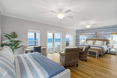 HIGHLIGHTS: - Beachfront beauty - Gorgeous Gulf views - 3 levels
