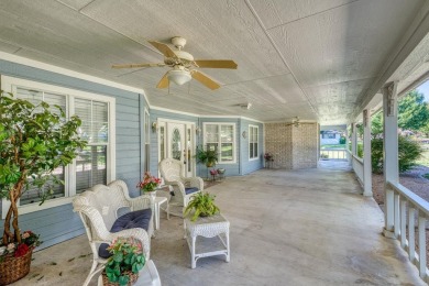 This CUSTOM, CHARMING home, in the heart of MEADOWLAKES, on