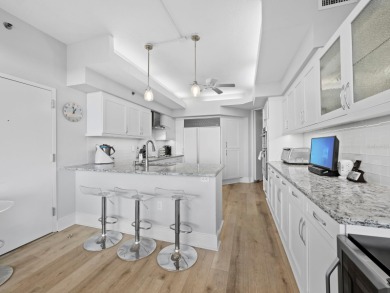 Set above the sparkling waters of Sarasota Bay, this beautifully