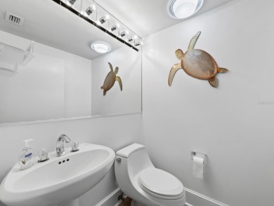 Set above the sparkling waters of Sarasota Bay, this beautifully