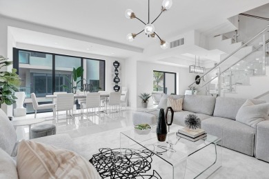 Newer construction-corner 2-story condo w/floor-to-ceiling glass