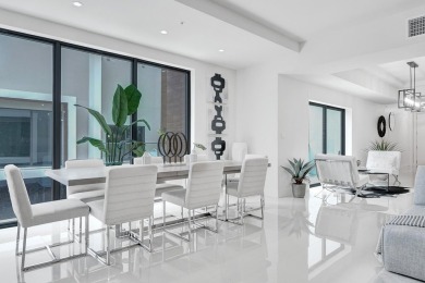 Newer construction-corner 2-story condo w/floor-to-ceiling glass