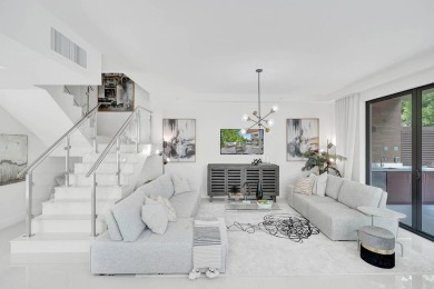 Newer construction-corner 2-story condo w/floor-to-ceiling glass