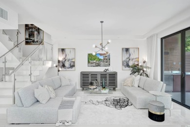 Newer construction-corner 2-story condo w/floor-to-ceiling glass