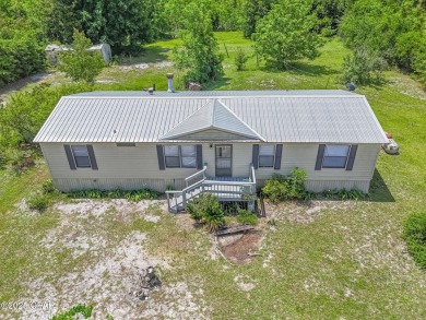 Charming 3-Bedroom Home on 1+ Acre with Pond & Fruit Trees