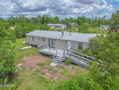 Charming 3-Bedroom Home on 1+ Acre with Pond & Fruit Trees