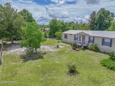 Charming 3-Bedroom Home on 1+ Acre with Pond & Fruit Trees