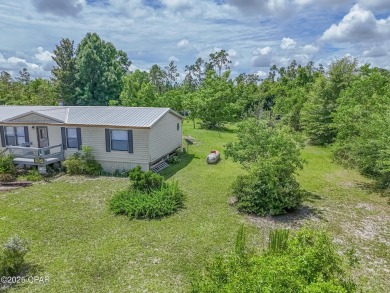Charming 3-Bedroom Home on 1+ Acre with Pond & Fruit Trees
