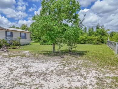 Charming 3-Bedroom Home on 1+ Acre with Pond & Fruit Trees
