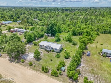 Charming 3-Bedroom Home on 1+ Acre with Pond & Fruit Trees