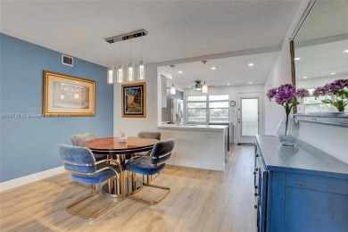 Enjoy resort-style living in Wynmoor's sought-after Antigua I