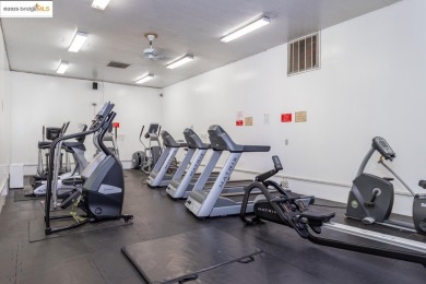 NOW YOU SEE IT. NOW YOU DON'T. Custom cabinetry by B & C