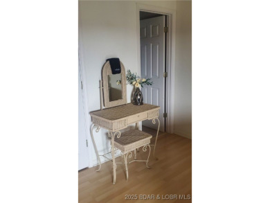 Unit 243A is a stunning lakefront condo on the 4th floor, with