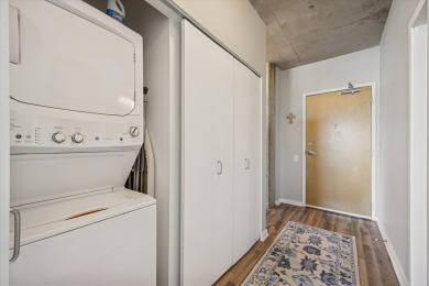 Experience luxury city living in this highly sought-after corner