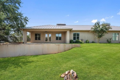 Enjoy tranquil golf course living and sweeping views from this