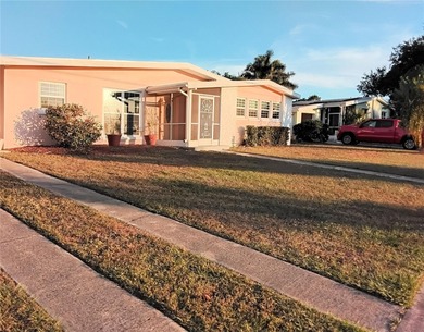 Well-maintained home with view of spring fed freshwater canal