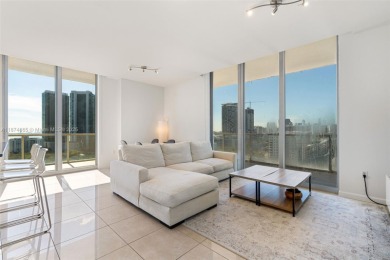 Modern 2BR/3BA condo at 2 Midtown Miami featuring