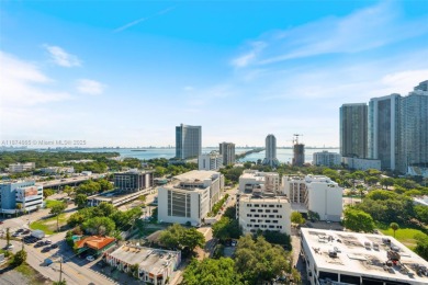 Modern 2BR/3BA condo at 2 Midtown Miami featuring