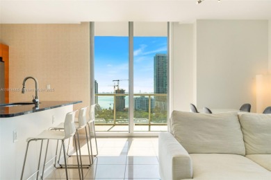 Modern 2BR/3BA condo at 2 Midtown Miami featuring