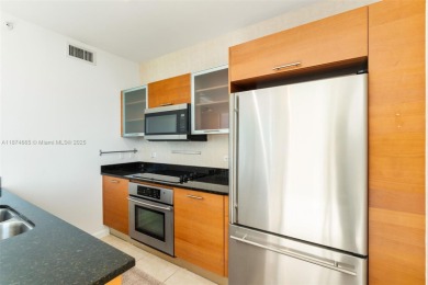Modern 2BR/3BA condo at 2 Midtown Miami featuring