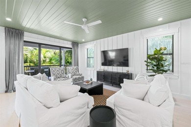 This exceptional newer-built coastal retreat on Lido Key