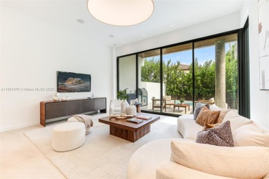 This brand new, luxurious 3 story townhome is perfectly situated