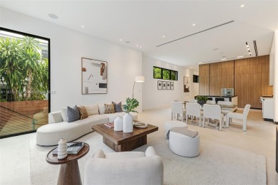 This brand new, luxurious 3 story townhome is perfectly situated