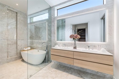 This brand new, luxurious 3 story townhome is perfectly situated