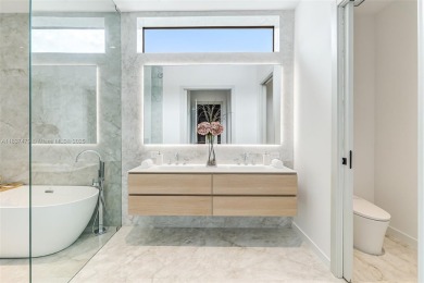 This brand new, luxurious 3 story townhome is perfectly situated