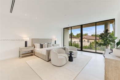 This brand new, luxurious 3 story townhome is perfectly situated