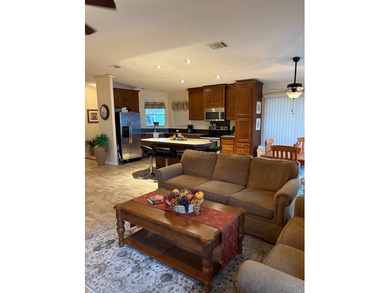 Welcome to your new home in a GATED 55+ community, offering the