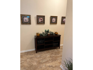 Welcome to your new home in a GATED 55+ community, offering the