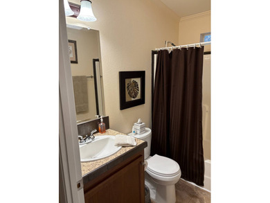 Welcome to your new home in a GATED 55+ community, offering the