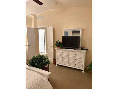 Welcome to your new home in a GATED 55+ community, offering the