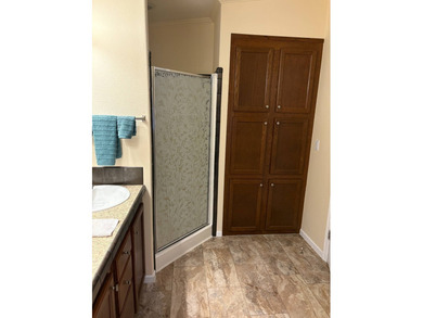 Welcome to your new home in a GATED 55+ community, offering the