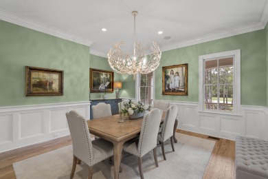This Lowcountry Estate sits on a park-like private lot with
