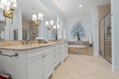 This Lowcountry Estate sits on a park-like private lot with