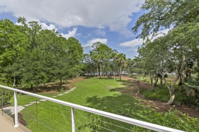 This Lowcountry Estate sits on a park-like private lot with